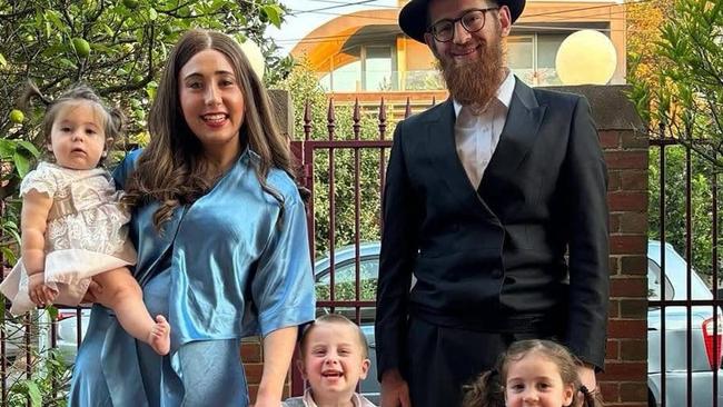 St Kilda religious leader Rabbi Effy Block and his family outside their home which was vandalised on Tuesday November 26, 2024. Picture: Supplied