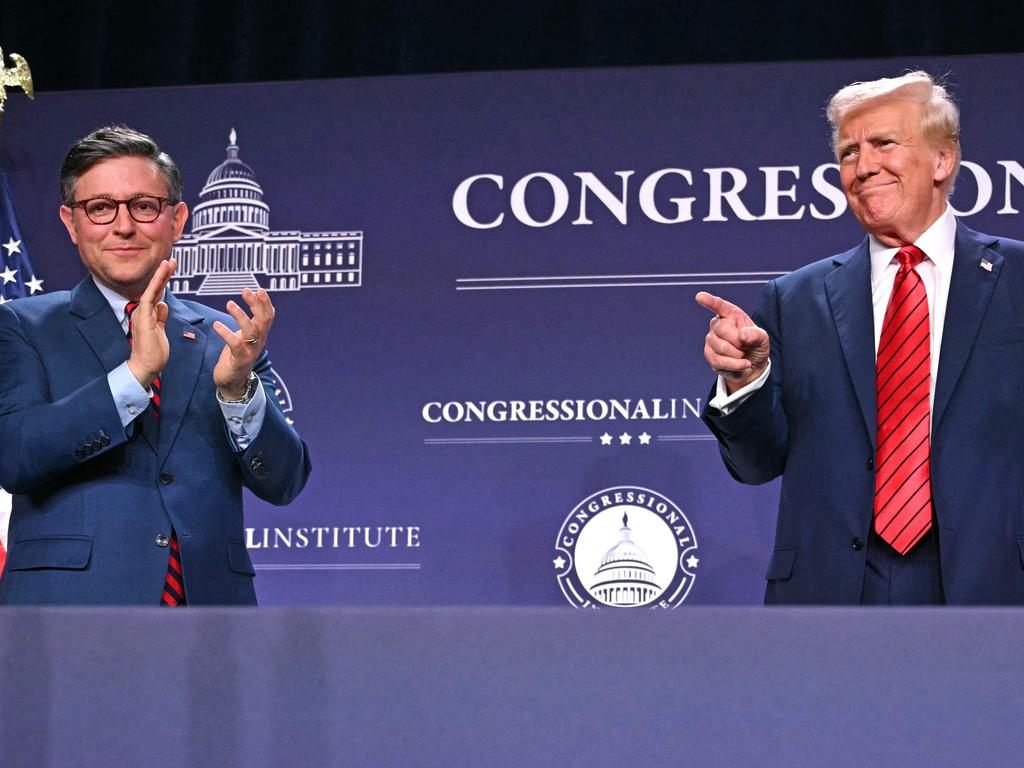 US President Donald Trump on stage alongside Speaker of the House Mike Johnson at the House Republican Members Conference Dinner at Trump National Doral Miami. Picture: AFP