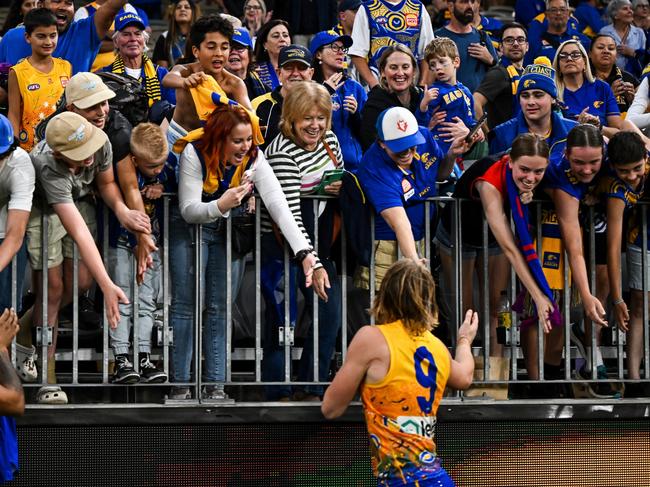 PERTH, AUSTRALIA - MAY 19: Harley Reid of the Eagles celebrates the win with the fans during the 2024 AFL Round 10 match between Waalitj Marawar (West Coast Eagles) and Narrm (Melbourne Demons) at Optus Stadium on May 19, 2024 in Perth, Australia. (Photo by Daniel Carson/AFL Photos via Getty Images)