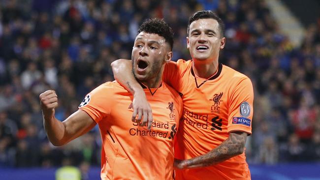 Liverpool's Alex Oxlade-Chamberlain (L) celebrates with Philippe Coutinho after scoring.