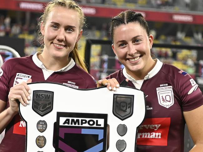 TOWNSVILLE, AUSTRALIA - JUNE 22: Tamika Upton and Romy Teitzel of the Maroons celebrate after winning the series during game two of the women's state of origin series between New South Wales Skyblues and Queensland Maroons at Queensland Country Bank Stadium on June 22, 2023 in Townsville, Australia. (Photo by Ian Hitchcock/Getty Images)