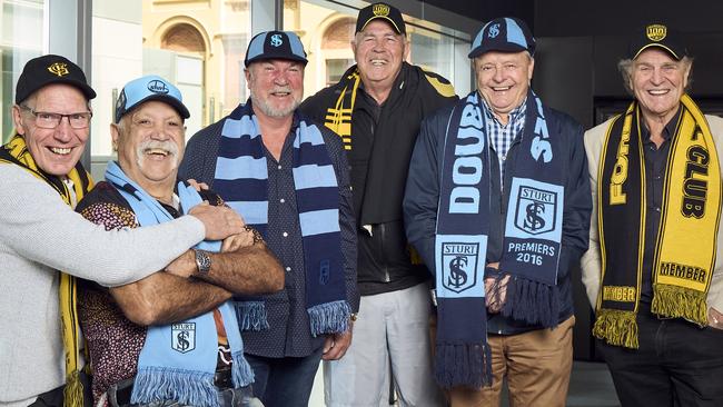 1974 SANFL grand final combatants, from left, Neville Caldwell, Michael Graham, Robbert Klomp, Peter Carey, Phil 'Sandy' Nelson and Graham Cornes were brought together this week to reminisce about the famous game. Picture: Matt Loxton