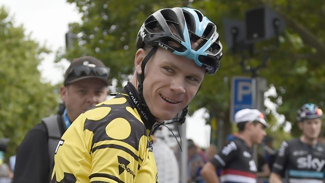 Britain’s Chris Froome of Team Sky wearing the King of the mountains jersey smiles before stage two of the 2016 Herald Sun Tour cycling race, Yarra Glen to Moe, in Victoria on February 5, 2016. AFP PHOTO / MAL FAIRCLOUGH -- IMAGE STRICTLY RESTRICTED TO EDITORIAL USE - STRICTLY NO COMMERCIAL USE --