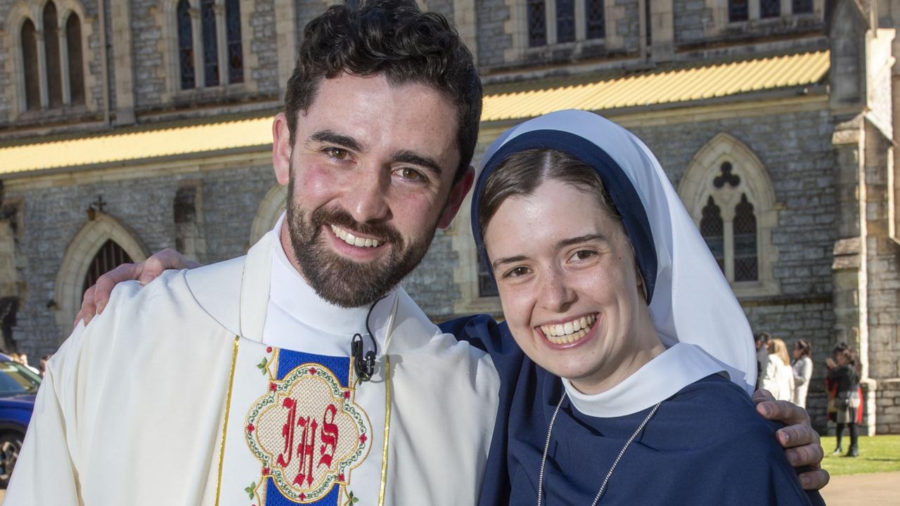 Father Nathan Webb is congratulated by his sister Nancy, Sister Rose Patrick O'Connor, outside St Patrick’s Cathedral after Fr Nathan’s ordination ceremony. Picture: Nev Madsen.