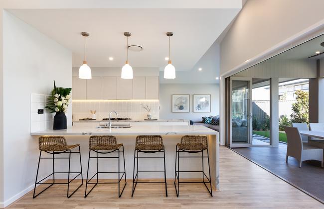 A large walk-in pantry is a bonus, allowing plenty of space for groceries and leaving the abundant kitchen cabinets free for cups, crockery and pots.