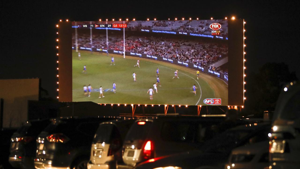 Watching the AFL at the Dromana 3 Drive-In in Melbourne.