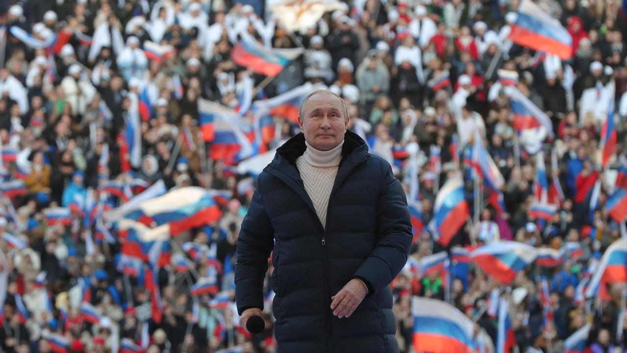 President Vladimir Putin attends a concert marking the eighth anniversary of Russia's annexation of Crimea at the Luzhniki stadium in Moscow. Picture: AFP