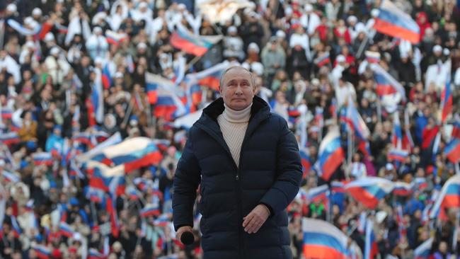 President Vladimir Putin attends a concert marking the eighth anniversary of Russia's annexation of Crimea at the Luzhniki stadium in Moscow. Picture: AFP