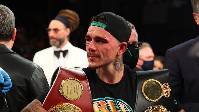 George Kambosos Jr with the belts he won. Photo by Rich Graessle/Icon Sportswire via Getty Images