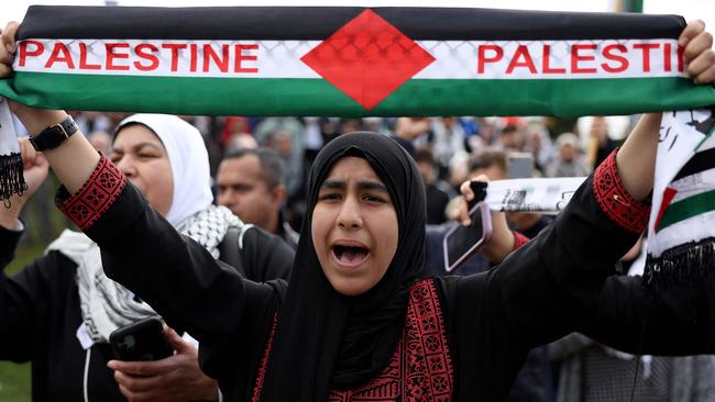 A pro-Palestinian protester holds up a banner during a demonstration in Washington, DC. Picture: Getty Images