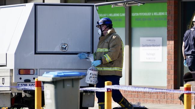 Police remove evidence from a premises at Clark Tce, Seaton. Picture: AAP/MIKE BURTON