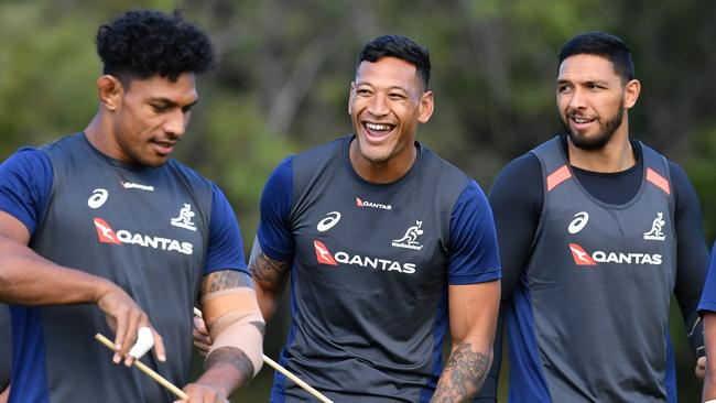 Israel Folau, centre, with Wallabies teammates at Ballymore yesterday