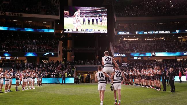 Tom Hawkins is chaired off after his 300th game. Picture: Sarah Reed/AFL Photos via Getty Images