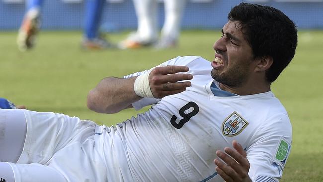 Uruguay’s Luis Suarez is in trouble again for biting.