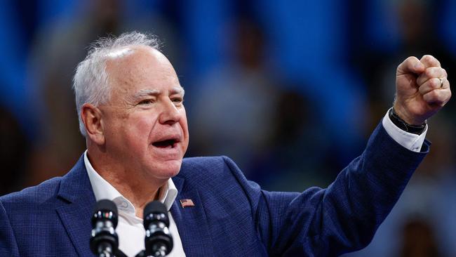 Minnesota Governor and Democratic vice presidential candidate Tim Walz speaks at a campaign rally in support of Vice President and Democratic presidential candidate Kamala Harris at Alliant Center in Madison, Wisconsin, on October 22, 2024. (Photo by KAMIL KRZACZYNSKI / AFP)