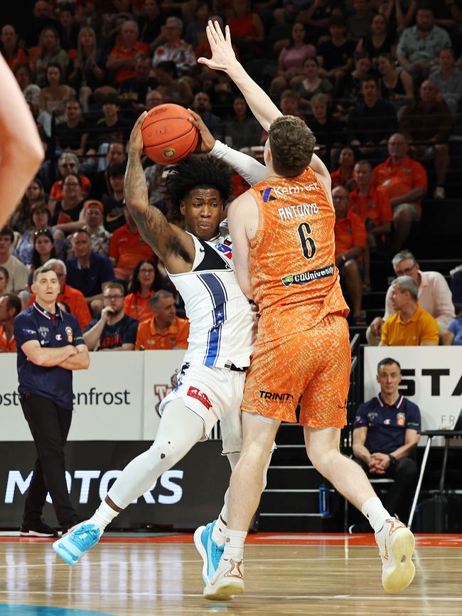 Adelaide's Kendric Davis runs into Taipans' Jonah Antonio in the National Basketball League (NBL) match between the Cairns Taipans and the Adelaide 36ers, held at the Cairns Convention Centre. Picture: Brendan Radke