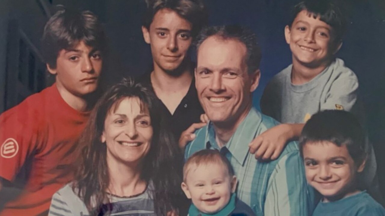 Angie and Steve Nichol with their five boys in younger years.