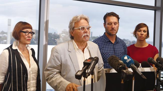 John Ruszczyk (second left), Justine Damond Ruszczyk’s father, accompanied by his wife Marian Hefferen (left), Jason Ruszczyk (second right) and his wife Katarina, read a statement in Sydney, last December. 2017. Picture: AAP.