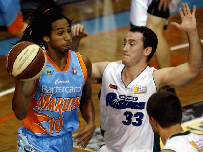 Cairns Marlins v's Gold Coast Rollers. Marlins Matthew Adekponya and Rollers Scott Paget.