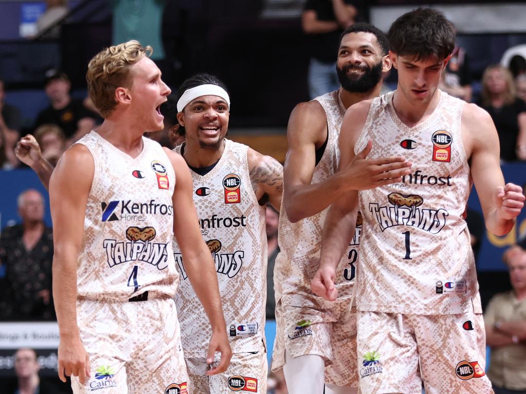 Taran Armstrong of the Taipans celebrates triggering a foul on the last play of the match to win the game. Picture: Getty Images