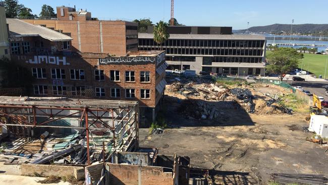 Demolition of the old Frogy’s site for the construction of the $234 million Waterside development has ground to a halt with the contractor owed hundreds of thousands of dollars. Picture: Richard Noone