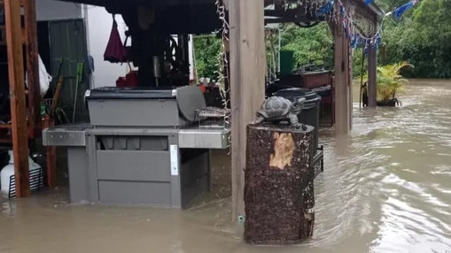 Cardwell family and neighbours devastated by rising floodwaters. Picture: Supplied.