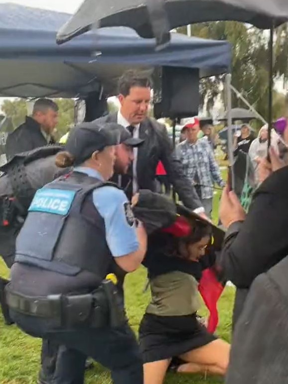 Lidia Thorpe was forced to the ground by police and protesters after she tried to disrupt British trans critic Kellie-Jay Keen-Minshull. Picture: sbasfordcanales/Twitter