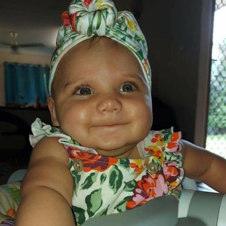 Aamiyah-jaynara Koops-Assan, of Nhulunbuy, smiling at her aunty while she captures her beautiful smile for the first time. Picture: Shanese Smith<br/>