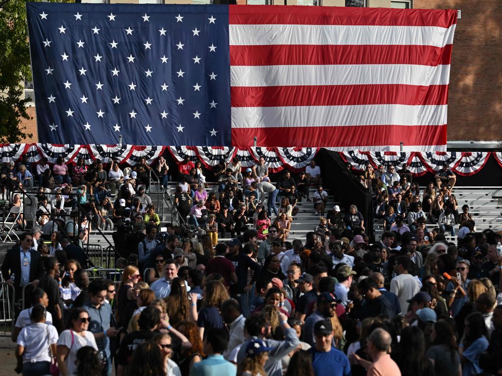 A large American flag is raised before US Vice President Kamala Harris speaks at Howard University in Washington, DC, on November 6, the day after the election. Picture: Mandel Ngan/AFP