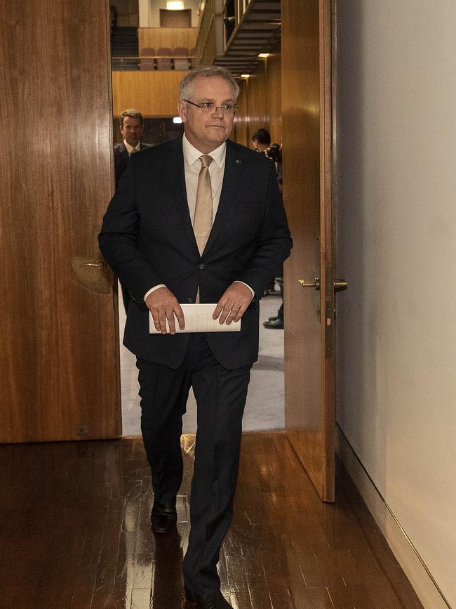 Prime Minister Scott Morrison leaves a media briefing yesterday. Picture: Gary Ramage