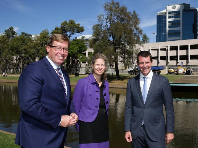 Deputy Premier Troy Grant, NSW Premier Mike Baird, Deputy Premier and Powerhouse Museum director Dolla Merrillees in front of the preferred location for the Powerhouse Museum to move to in Parramatta. Picture: Jonathan Ng