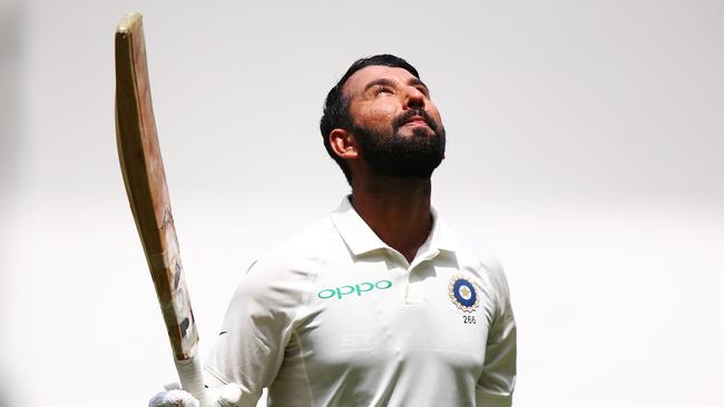 Cheteshwar Pujara salutes after his century. Picture: Getty