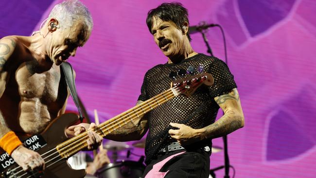 Red Hot Chili Peppers Anthony Kiedis on stage for their first concert at Accor Stadium at Sydney Olympic Park. Picture: Jonathan Ng