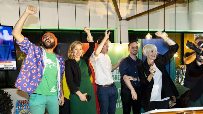 Jonathan Sriranganathan, Senator Larissa Waters, Griffith MP Max Chandler-Mather, Brisbane MP Stephen Bates and Ryan MP Elizabeth Watson-Brown celebrate three new Greens’ MPs on election night in May 2022. Picture: Richard Walker