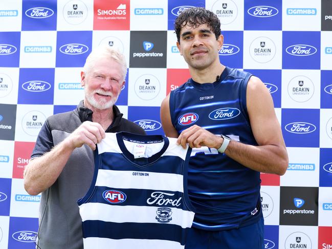 Neville Bruns presents Jack Martin with his guernsey. Picture: Geelong Cats