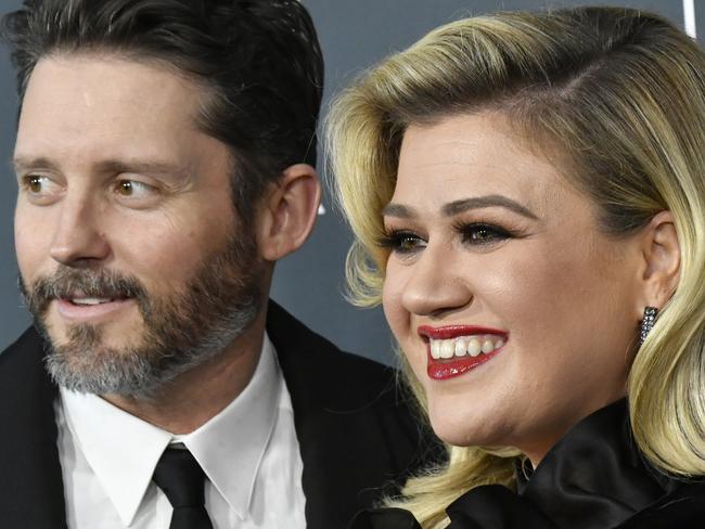 FILE - JUNE 11: Singer Kelly Clarkson has filed for divorce from Brandon Blackstock after nearly seven years of marriage. SANTA MONICA, CALIFORNIA - JANUARY 12: (L-R) Brandon Blackstock and Kelly Clarkson attend the 25th Annual Critics' Choice Awards at Barker Hangar on January 12, 2020 in Santa Monica, California. (Photo by Frazer Harrison/Getty Images)