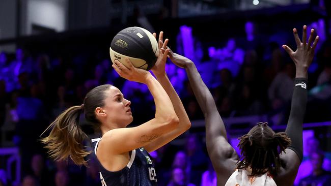 GEELONG, AUSTRALIA - OCTOBER 30: Hannah Hank of Geelong United shoots against Nya Lok of the Townsville Fire during the round one WNBL match between Geelong United and Townsville Fire at The Geelong Arena, on October 30, 2024, in Geelong, Australia. (Photo by Kelly Defina/Getty Images)