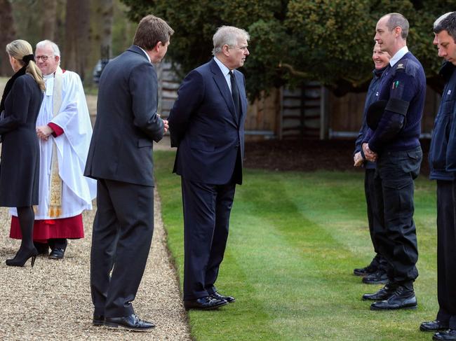 Prince Andrew talks to staff after attending to a church service at Windsor. Picture: AFP