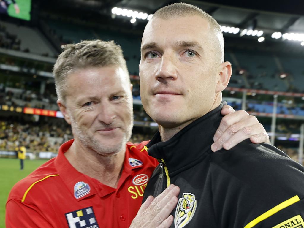 NCA. MELBOURNE, AUSTRALIA. August 24, 2024. AFL Round 24. Richmond vs. Gold Coast Suns at the MCG. Richmonds Dustin Martin hugs old coach Damien Hardwick on the MCG during his lap of honour. Pic: Michael Klein