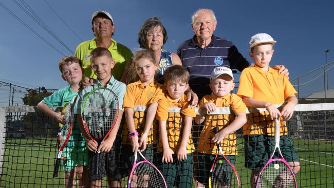 Jim’s Easy Tennis School head coach Jim Zrilic with players Valerie Arthur, Wolf Hanke and the Jafremkov and Hananio family children. Users have opposed the relocation of the courts. Picture: Simon Bullard