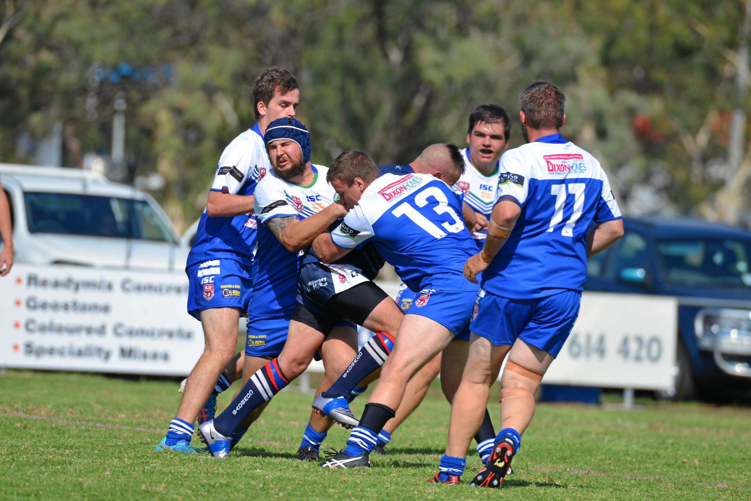 The Stanthorpe Gremlins defend strongly in a 38-16 second-division win against Warwick Cowboys at Father Ranger Oval. Picture: Gerard Walsh