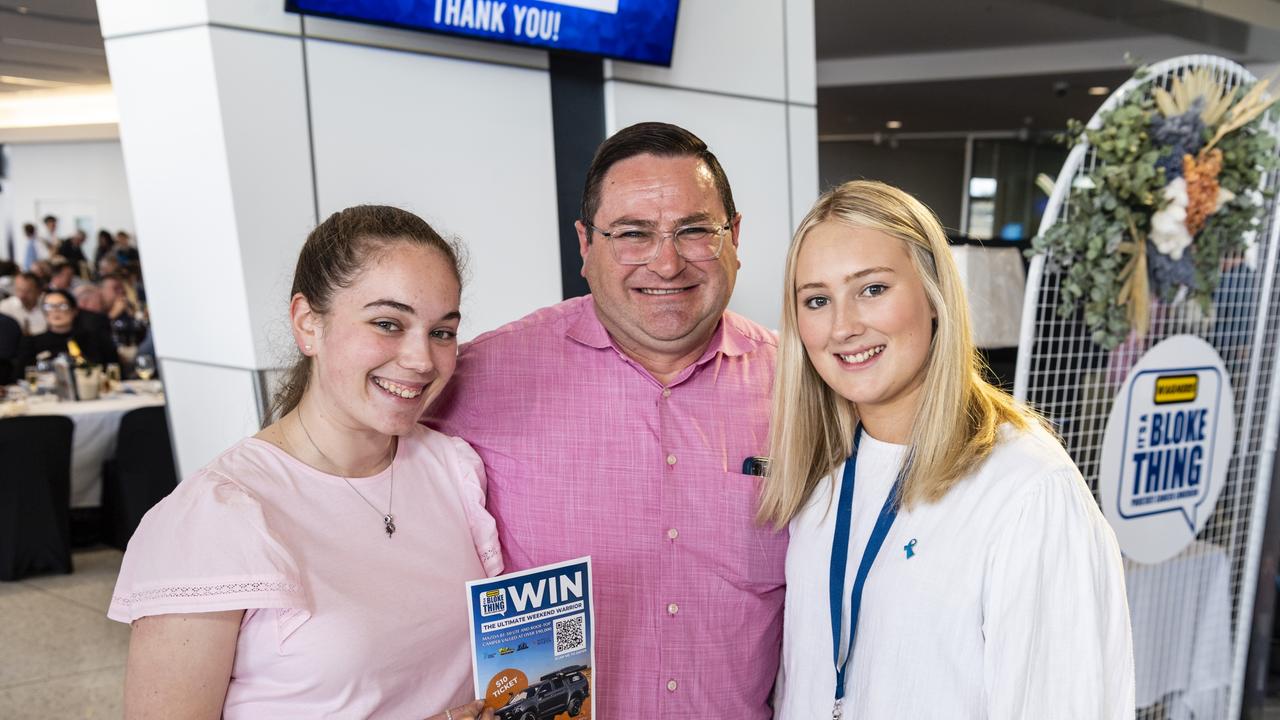 Wippells dealer principal David Russell with daughters Mikayla (left) and Felicity Russell helping to raffle tickets in the Weekend Warrior car raffle at It's a Bloke Thing 2022 at Wellcamp Airport, Friday, September 9, 2022. Picture: Kevin Farmer