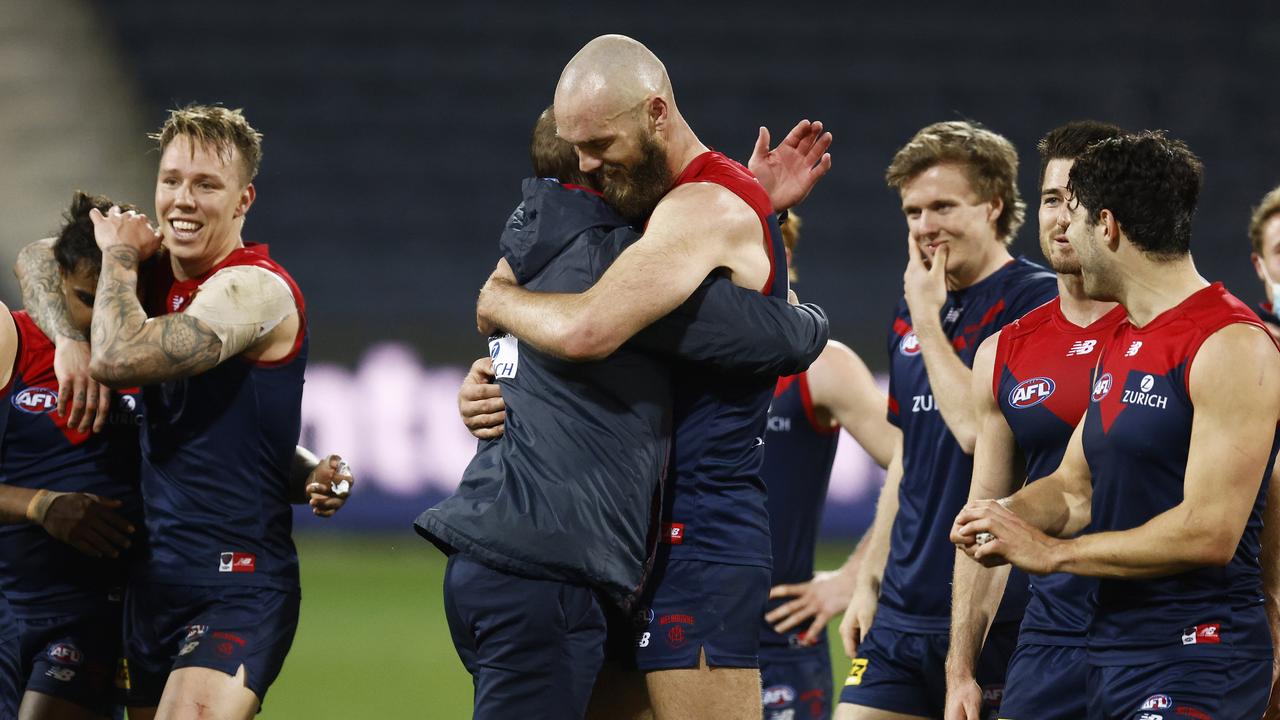 Simon Goodwin hugs Max Gawnafter winning after the siren. Picture: Getty Images