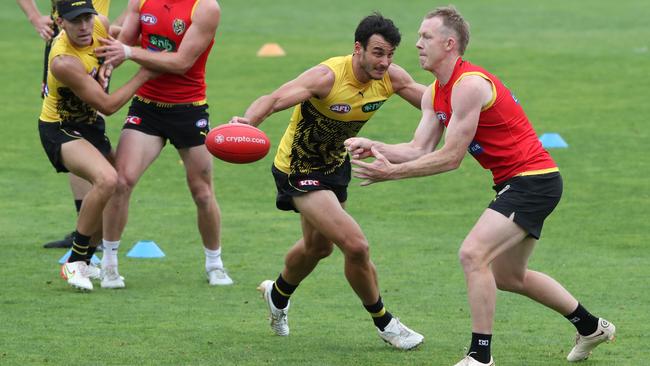 Jack Riewoldt dishes off a handball. Picture: David Crosling