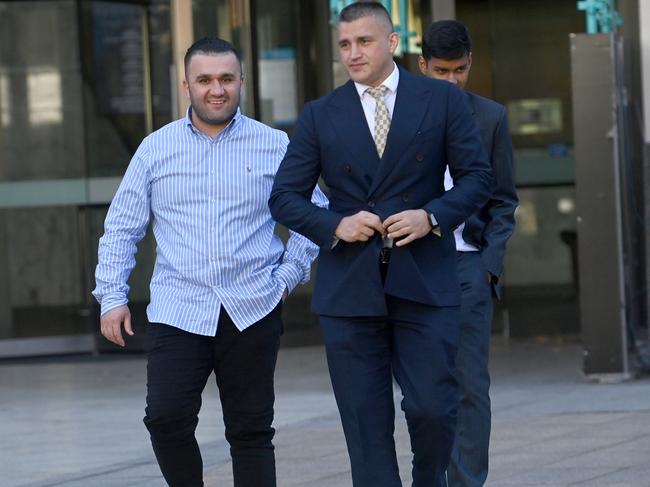 Sayed Moosawi leaving Parramatta District Court this week with his lawyer Zemarai Khatiz.