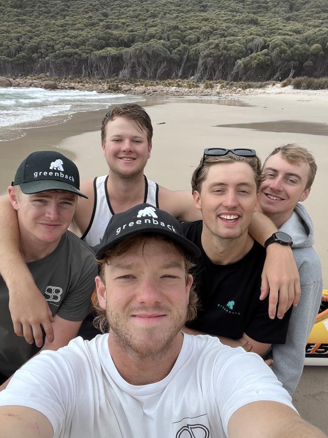Bass Strait kayakers front Matt Taubman and from left Tim Taylor, Edward Hosken, Jono Hargreaves and Ben Taylor. Picture Supplied.