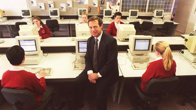 Tony Bell, principal of Glen Waverley High School, with students.