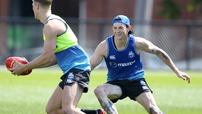 New Roo Jasper Pittard (right) goes through his paces. Picture: Michael Klein