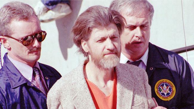 Theodore John Kaczynski is flanked by federal agents as he is led to a car from the federal courthouse in Helena/Mont.,  Apr 04,1996 the suspected Unabomber, was charged with one count of possession of bomb components.   AP Photo/John/Youngbear headshot crime o/seas bombing usa murder