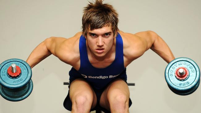 Dustin Martin pumping the weights before he was drafted by Richmond.